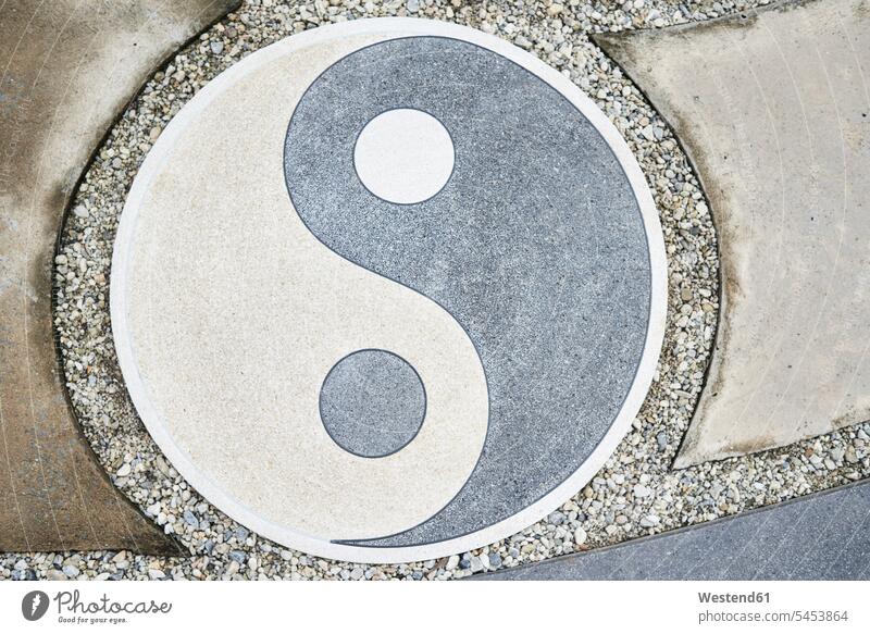 Yin Yang symbol on the floor Traditionally Thai stone stones Thailand symbolical picture Symbolism Traditionally Chinese Yin Yang Symbol Yin and Yang stony