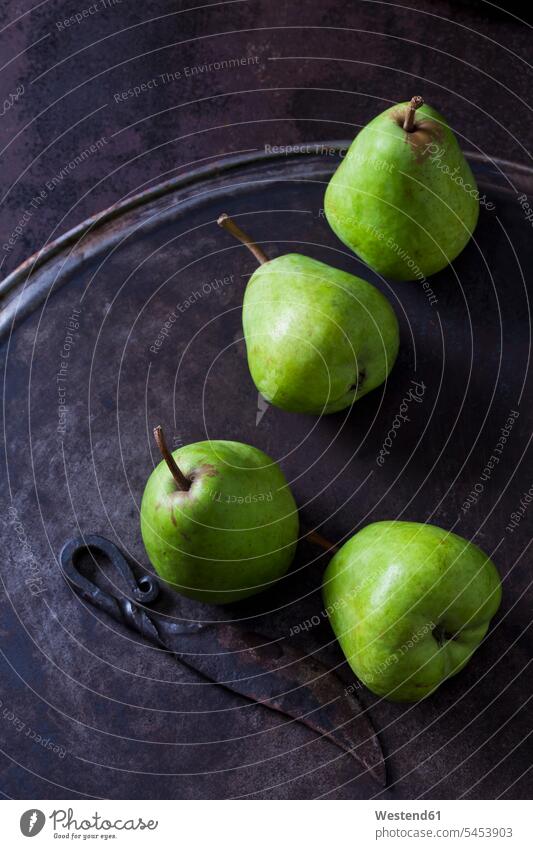 Four green pears 'Alexander Lucas' and an old knife on rusty ground nobody knives still life still-lifes still lifes Fruit Fruits Pear Pears firm