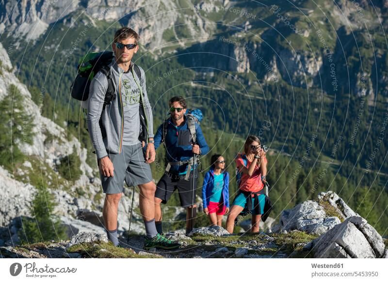 Italy, Friends trekking in the Dolomtes Dolomites Dolomite Alps mountaineering hiking climber alpinists climbers Mountain Climber mountaineers Mountain Climbers