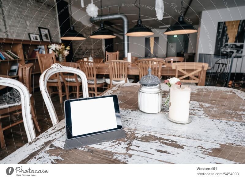 Digital tablet on a table in a cafe Absence Absent online wireless Wireless Connection Wireless Technology Wireless Communication accessibility accessible
