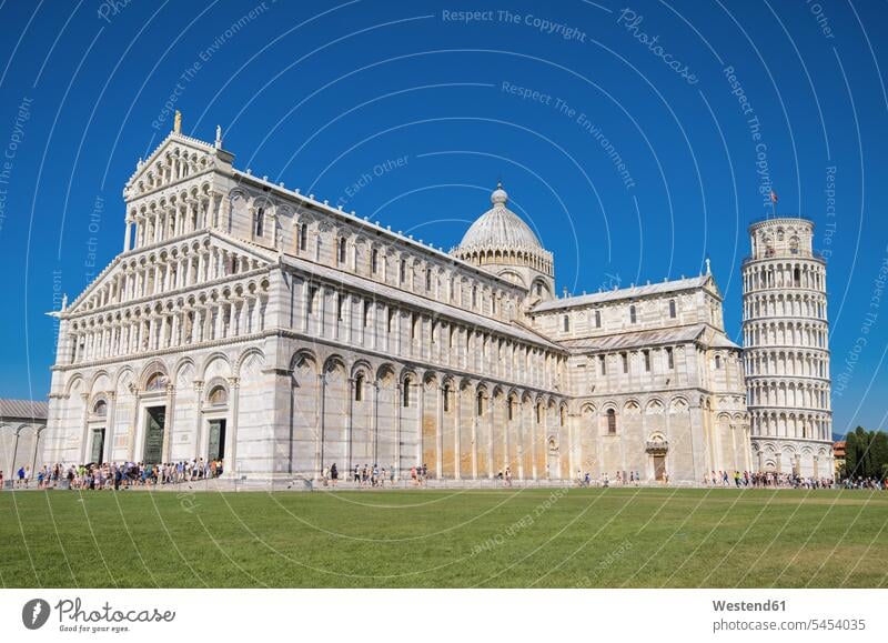 Italy, Tuscany, Pisa, View to Cathedral and Leaning Tower of Pisa from Piazza dei Miracoli outdoors outdoor shots location shot location shots Architecture