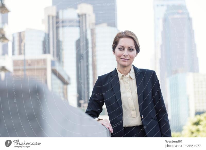 Portrait of confident businesswoman smiling smile businesswomen business woman business women portrait portraits business people businesspeople business world