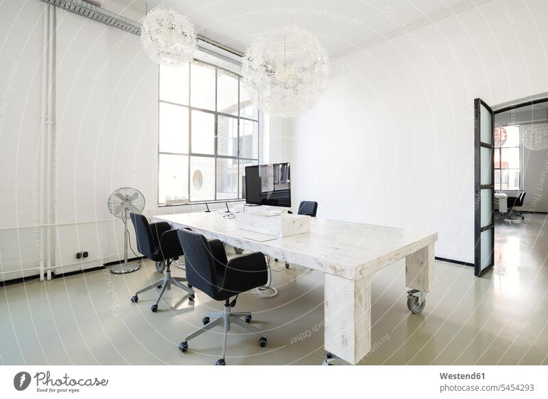 Interior of a modern agency office desk desks furnishing Furnishings occupation profession professional occupation jobs style stylish agencies business