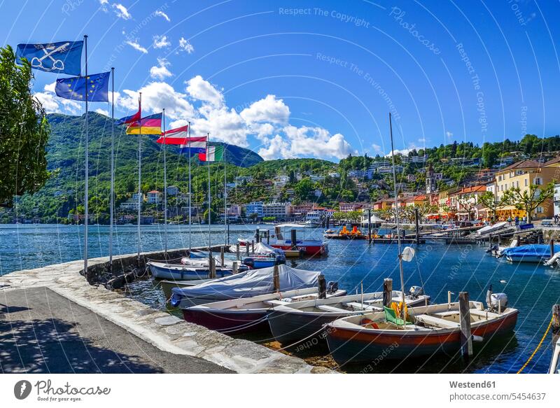 Switzerland, Ticino, Ascona moored anchor anchored anchoring house houses Cannobio outdoors outdoor shots location shot location shots mountain mountains cloud