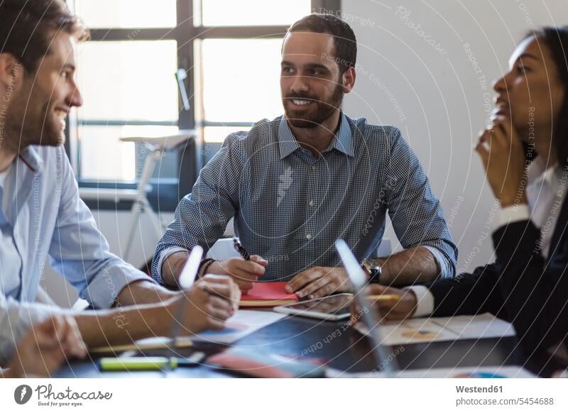 Business people having a meeting in office offices office room office rooms workplace work place place of work colleagues working At Work Business Meeting