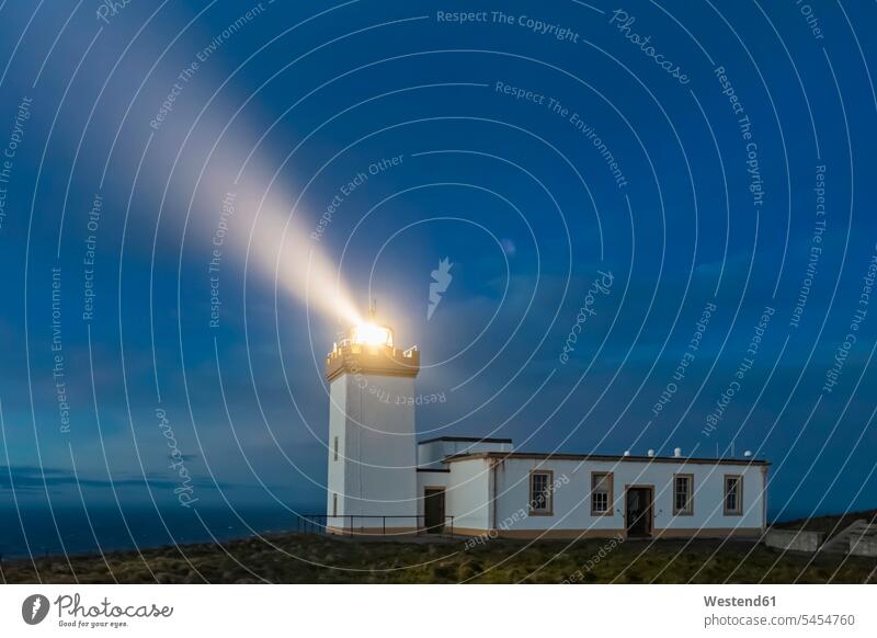 UK, Scotland, Caithness, Duncansby Head, Duncansby Head Lighthouse at blue hour illuminated lit lighted Illuminating John o' Groats John O'Groats Atlantic
