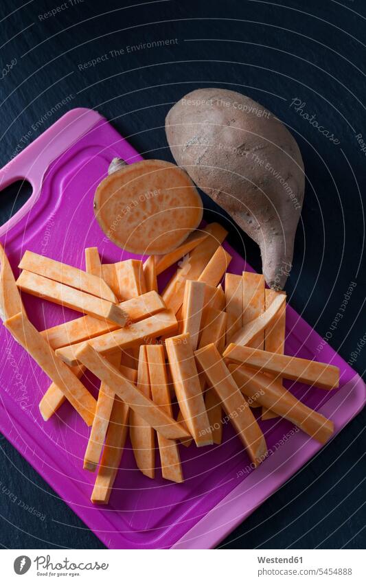 Sliced and whole sweet potato food and drink Nutrition Alimentation Food and Drinks focus on foreground Focus In The Foreground focus on the foreground