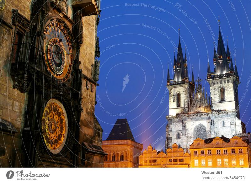 Czechia, Prague, part of Town Hall with Astronomic Clock and Church of Our Lady Before Tyn at dusk evening in the evening Old Town Historic City Old City