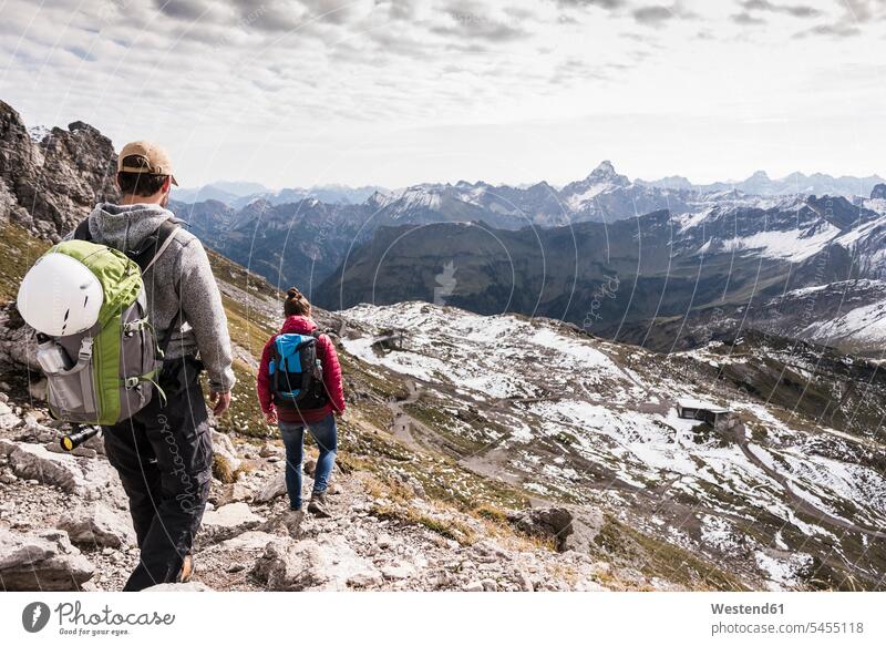 Germany, Bavaria, Oberstdorf, two hikers walking in alpine scenery mountain range mountains mountain ranges couple twosomes partnership couples going hiking