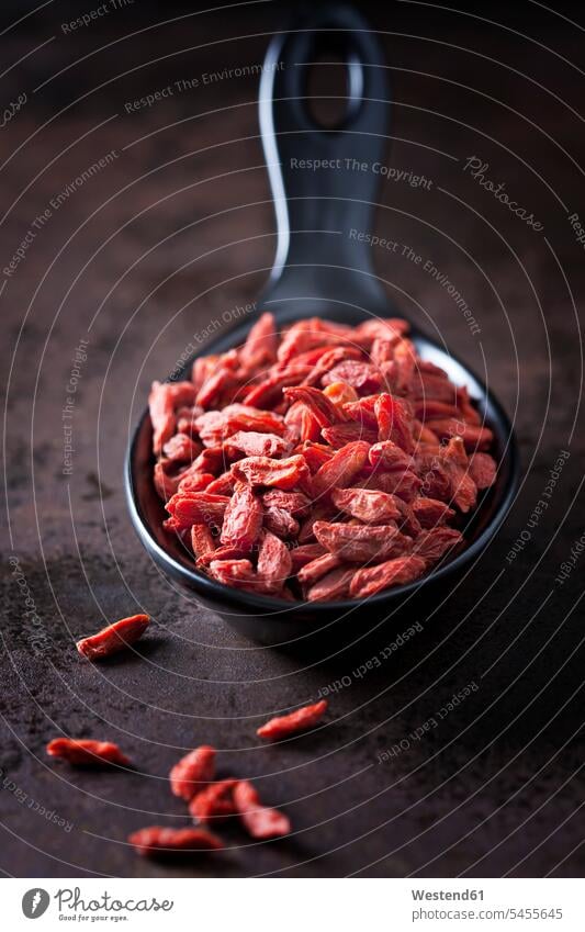 Spoon of dried wolfberries on rusty metal red dried fruit Dried Fruits Wolfberry Goji Berries Wolfberries Goji Berry Chinese boxthorn Chinese wolfberries