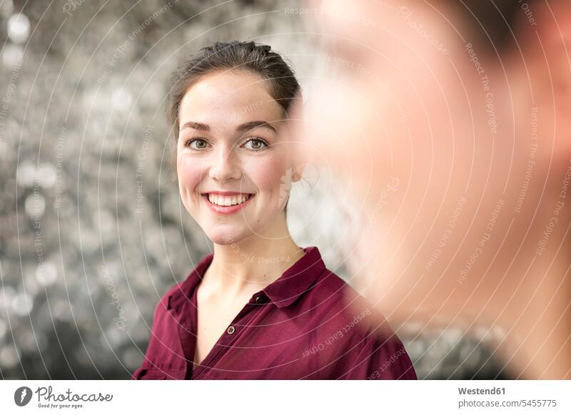 Portrait of smiling young businesswoman portrait portraits businesswomen business woman business women business people businesspeople business world
