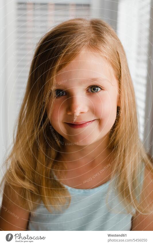 Portrait of blond little girl females girls portrait portraits child children kid kids people persons human being humans human beings friendly nice smiling