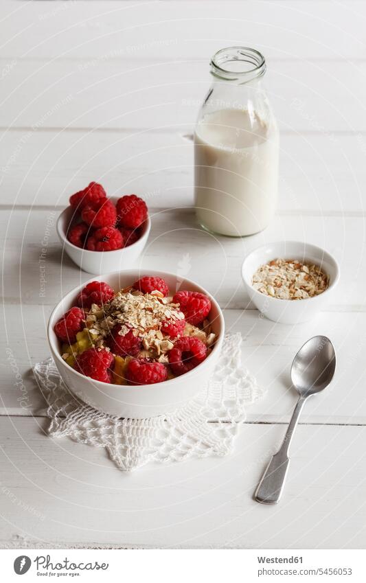 Bowl of porridge with raspberries food and drink Nutrition Alimentation Food and Drinks Oat Flakes rolled oats healthy eating nutrition Glass Bottle