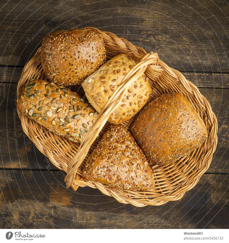 Baket with different grain rolls food and drink Nutrition Alimentation Food and Drinks rustic wickerbasket wicker basket wickerbaskets wicker baskets copy space