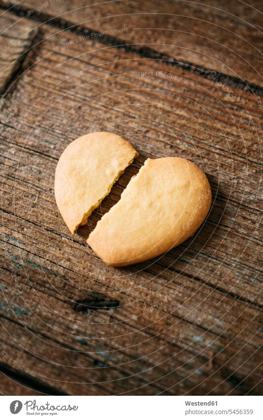 Broken heart-shaped Shortbread on wood food and drink Nutrition Alimentation Food and Drinks overhead view from above top view Overhead Overhead Shot