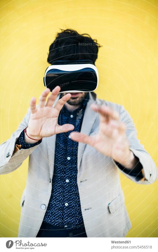Man wearing Virtual Reality Glasses man men males VR glasses Virtual-Reality Glasses virtual reality headset vr headset vr goggles