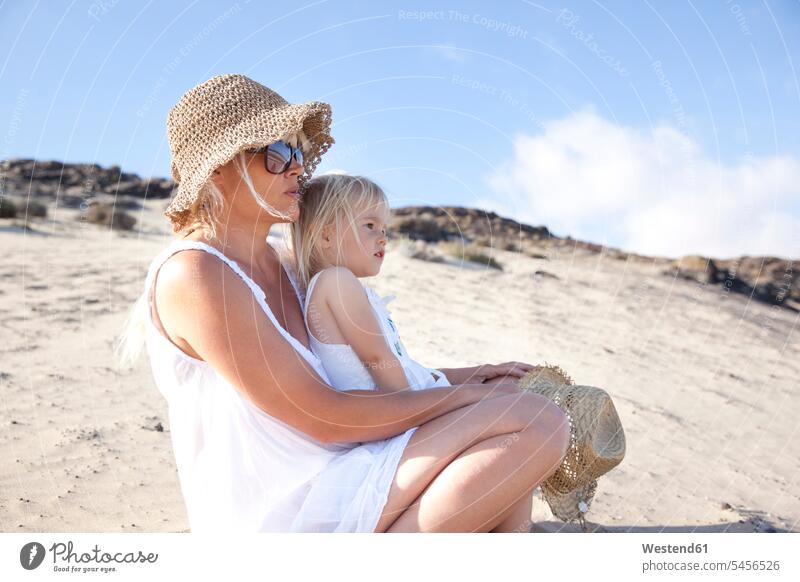 Spain, Fuerteventura, mother with daughter on the beach beaches mommy mothers ma mummy mama daughters parents family families people persons human being humans