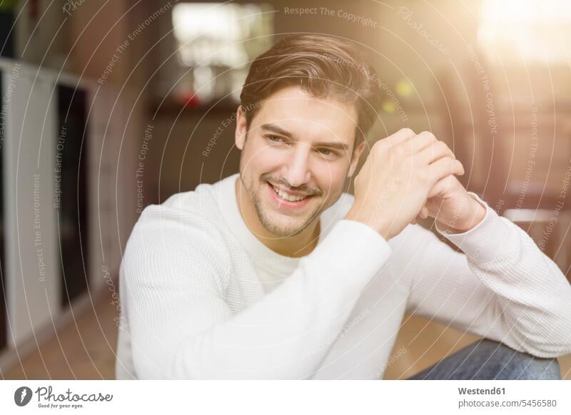 Portrait of smiling man at home men males smile Adults grown-ups grownups adult people persons human being humans human beings caucasian caucasian ethnicity