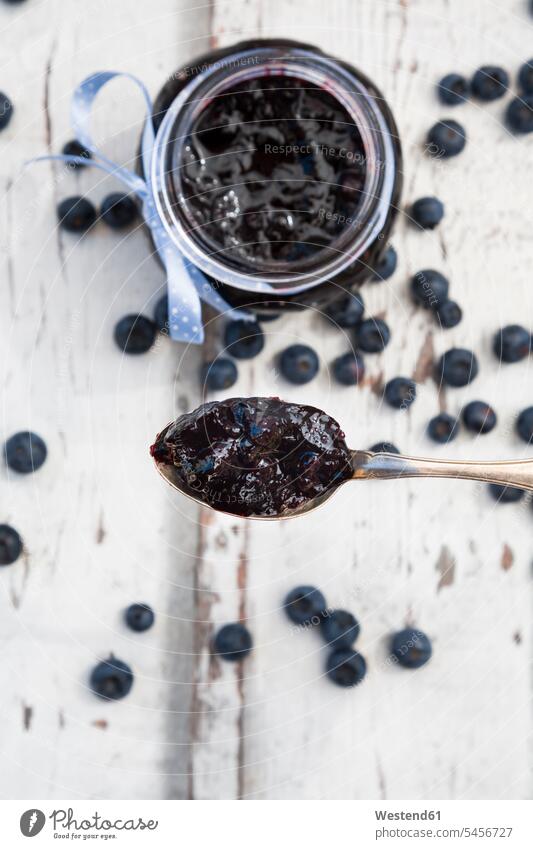 Spoon and glass of blueberry jam and blueberries food and drink Nutrition Alimentation Food and Drinks homemade home made home-made jam jar jam jars spoon