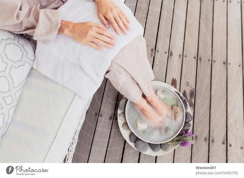 Close-up of woman having a footbath human human being human beings humans person persons caucasian appearance caucasian ethnicity european 1 one person only