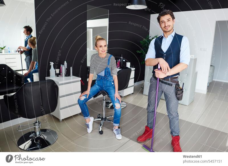 Portrait of confident hairdresser and woman in hair salon hair-dresser hair-dressers hairdressers haircutter haircutters portrait portraits confidence females