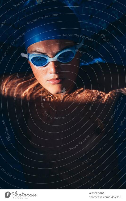 Portrait of paralympic young swimmer in a pool human human being human beings humans person persons caucasian appearance caucasian ethnicity european 1