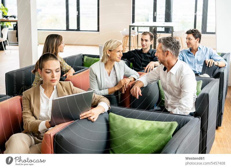 Business people meeting in sitting corner, talking human human being human beings humans person persons caucasian appearance caucasian ethnicity european Group