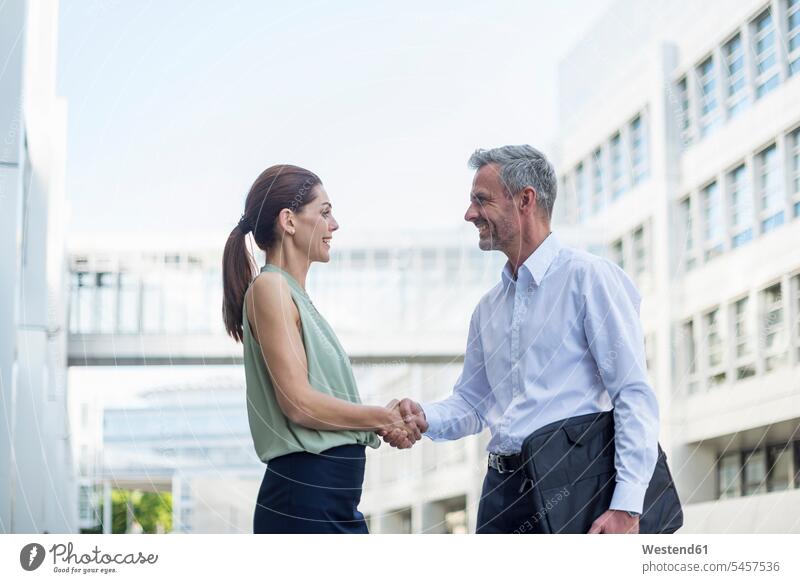 Businesspartners shaking hands business partner associates business associates business partners business people businesspeople business world business life