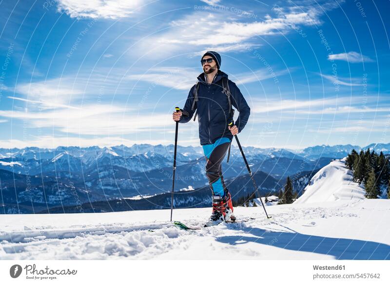 Germany, Bavaria, Brauneck, man on a ski tour in winter in the mountains hibernal Ski Touring ski tours men males mountainscape mountainscapes mountain scenery