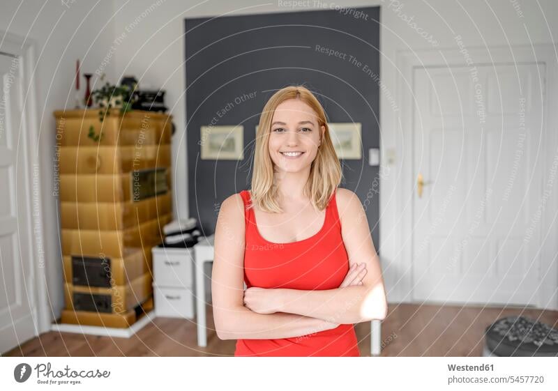 Portrait of smiling young woman at home human human being human beings humans person persons caucasian appearance caucasian ethnicity european 1 one person only