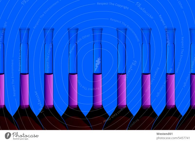 Row of test tubes with liquid blue background blue backgrounds equality copy space test-tube Testtube Testtubes Order Orderliness neat laboratory still life