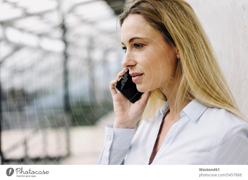 Portrait of a young businesswoman on the phone Occupation Work job jobs profession professional occupation business life business world business person