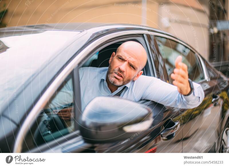Businessman driving car and looking angry human human being human beings humans person persons caucasian appearance caucasian ethnicity european 1