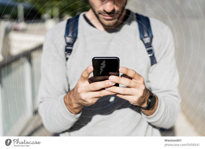 Close-up of man using smartphone in the city human human being human beings humans person persons caucasian appearance caucasian ethnicity european 1