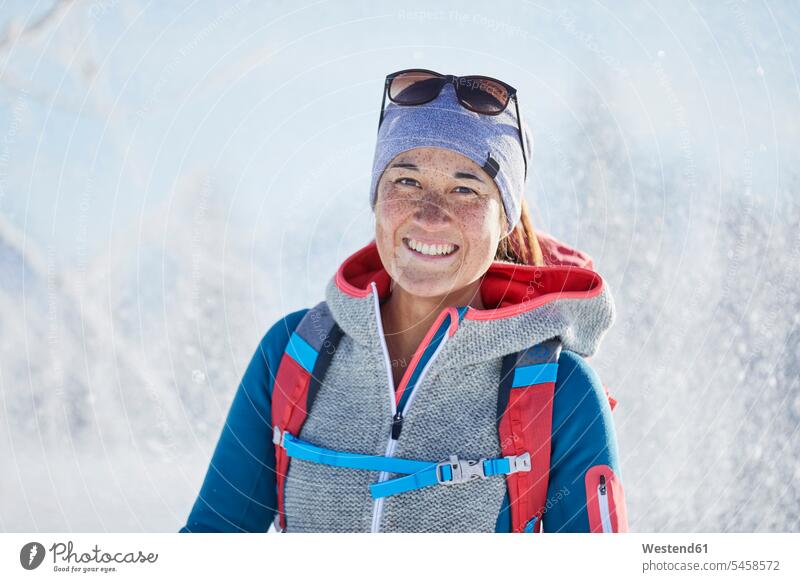 Austria, Tyrol, Portrait of smiling snowshoe hiker headband Headbands winter hibernal portrait portraits snowshoe hikers Joy enjoyment pleasure Pleasant delight