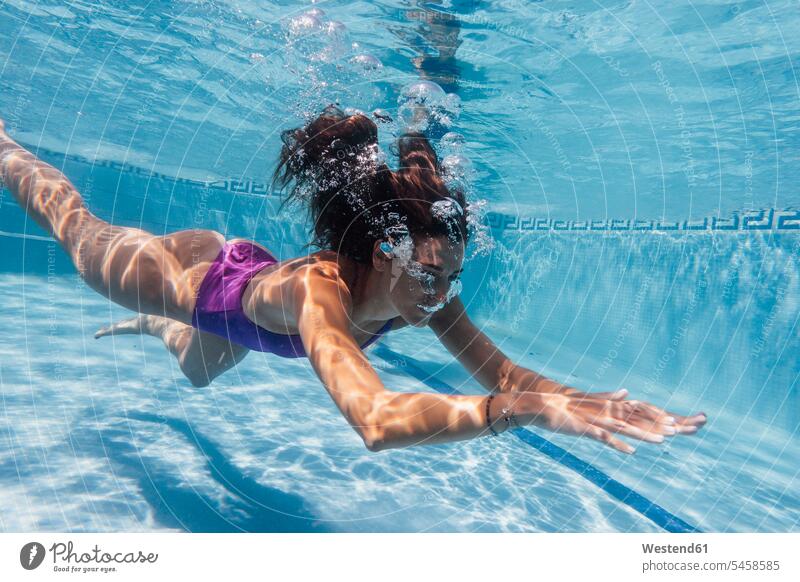 Woman underwater in a pool swim wear bathing costume bathing costumes bathing suit bathing suits Swimming Costume Swimming Suit swimsuits bathe Taking A Bath