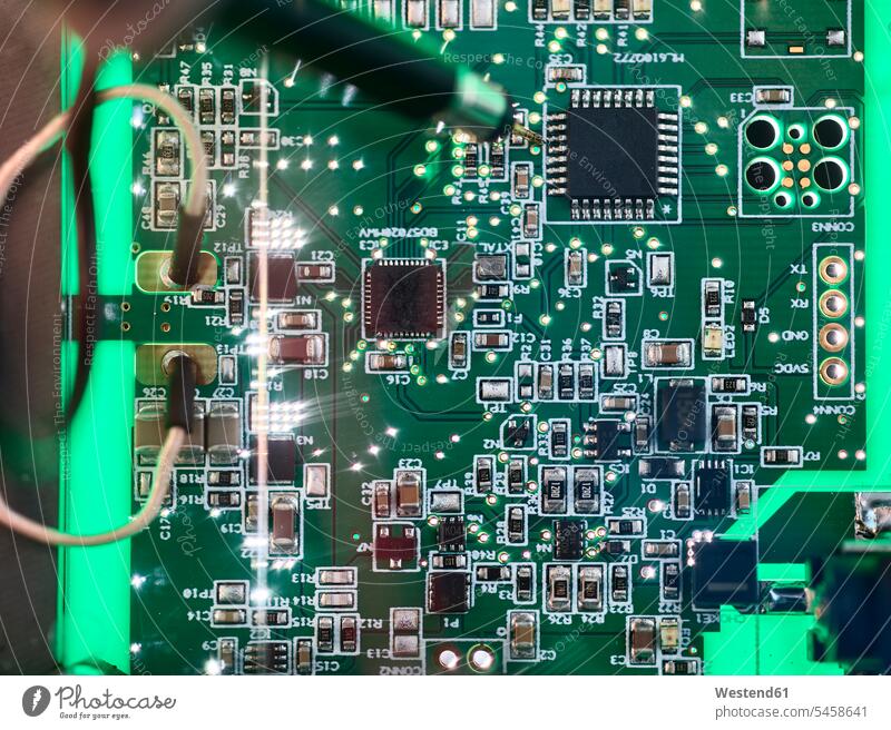 Circuit board with electronic components contemporary Technological technologies Electronic Devices industrial industries circuit boards hightech close up