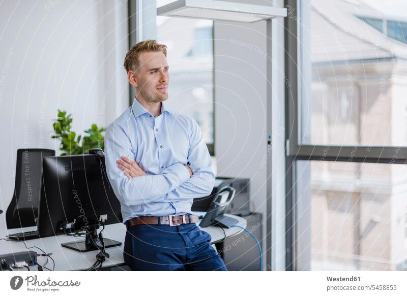 Portrait of confident businessman in office Occupation Work job jobs profession professional occupation business life business world business person