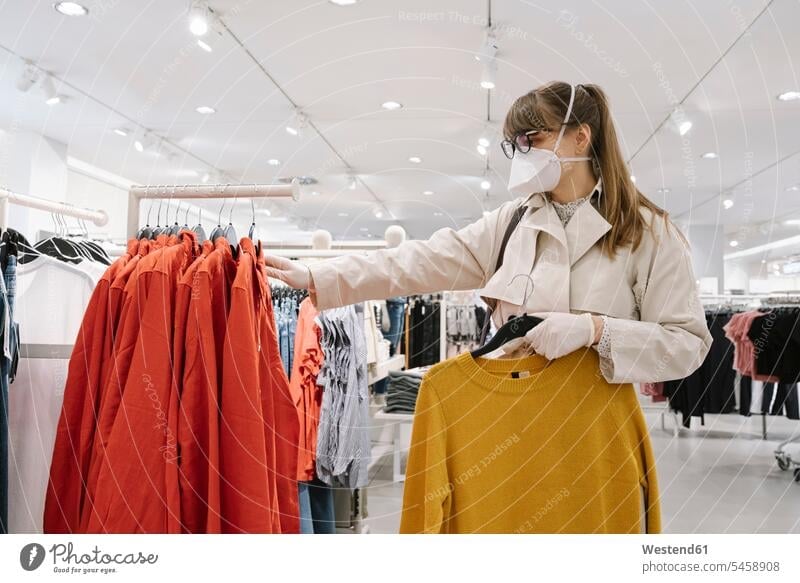 Woman with face mask and disposable gloves shopping in a fashion store Eye Glasses Eyeglasses specs spectacles buy health healthcare Healthcare And Medicines