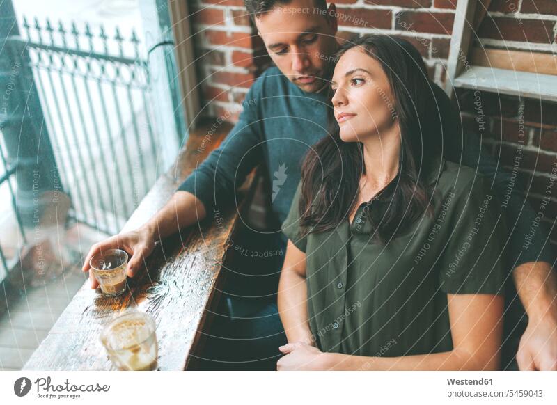 Couple having coffee in a cafe human human being human beings humans person persons caucasian appearance caucasian ethnicity european 2 2 people 2 persons two