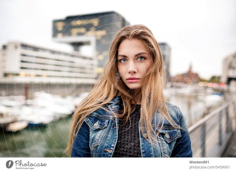 Portrait of attractive young woman at city harbor females women portrait portraits beautiful pretty good-looking Attractiveness Handsome town cities towns