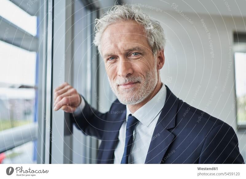 Portrait of confident businessman at the window Occupation Work job jobs profession professional occupation business life business world business person
