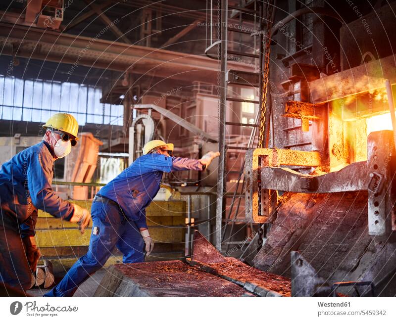 Industry, Smeltery, Workers checking blast furnace for fractures Austria Competence Skill smeltery Blast Furnace Protective Workwear Protective Work Wear
