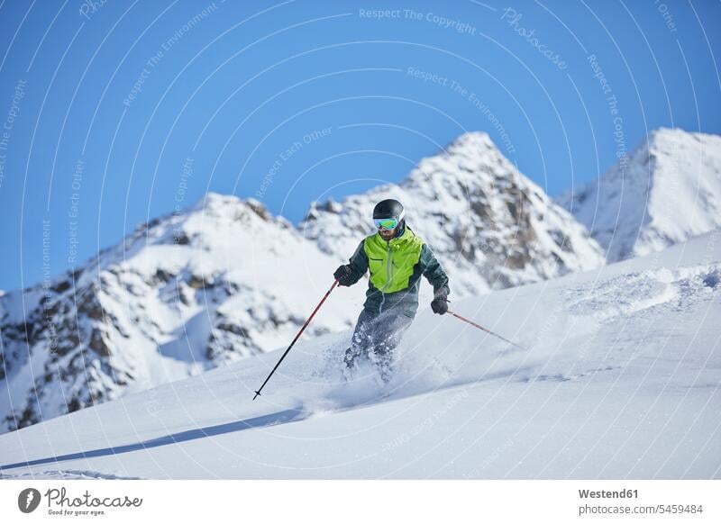 Austria, Tyrol, Kuehtai, man skiing in winter landscape riding skier skiers hibernal landscapes scenery terrain men males winter landscapes winter sport
