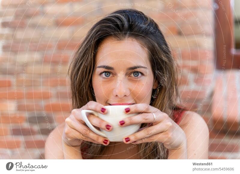 Portrait of young woman drinking cup of coffee human human being human beings humans person persons caucasian appearance caucasian ethnicity european 1