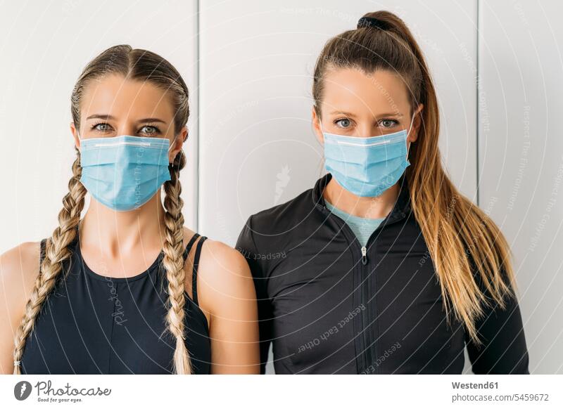 Portrait of two sporty women wearing face masks human human being human beings humans person persons caucasian appearance caucasian ethnicity european 2