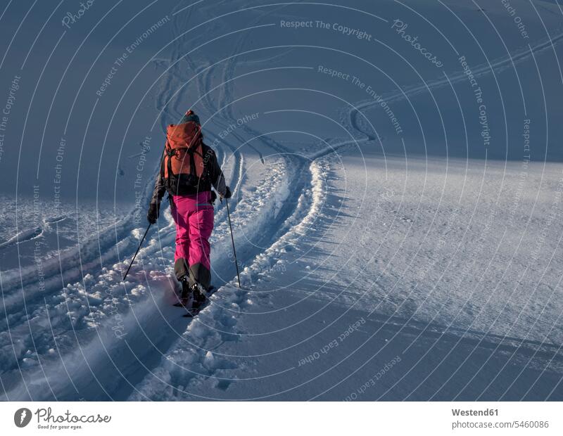 Switzerland, Bagnes, Cabane Marcel Brunet, Mont Rogneux, woman ski touring in the mountains Ski Touring ski tours Ski mountaineering females women Adults