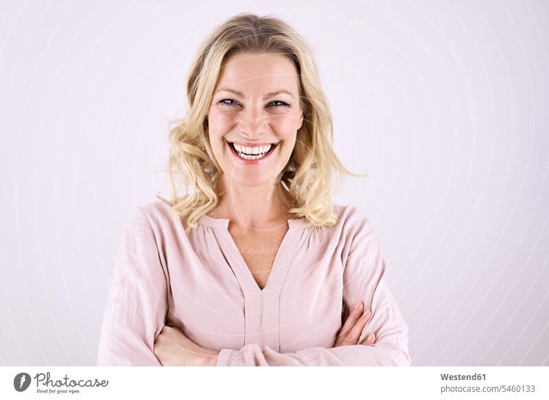 Portrait of smiling blond woman blond hair blonde hair smile portrait portraits females women people persons human being humans human beings Adults grown-ups