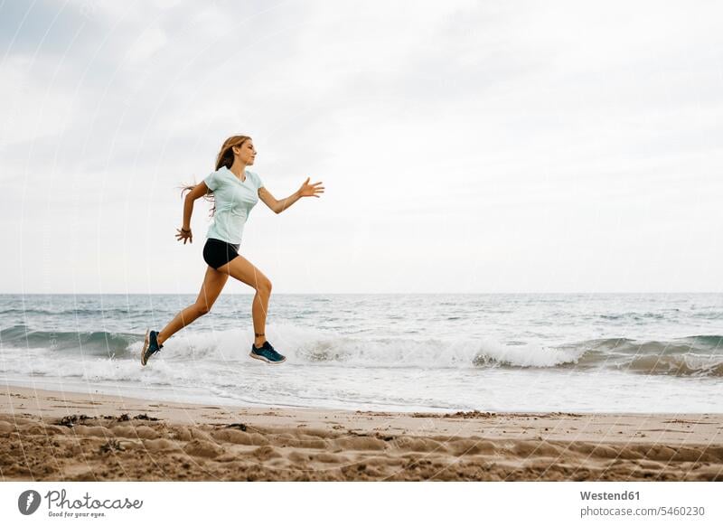 Female jogger at the beach human human being human beings humans person persons caucasian appearance caucasian ethnicity european 1 one person only