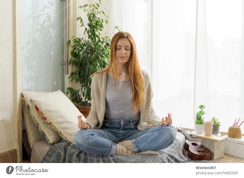Young woman practicing yoga at home human human being human beings humans person persons caucasian appearance caucasian ethnicity european 1 one person only